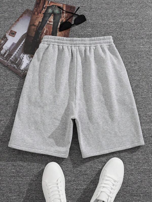 Men's solid color loose shorts, elastic waistband and drawstring, summer beach wear, men's casual and breathable summer clothing, suitable as a Father's Day gift