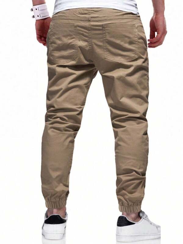 Loose Men's Pocket Patch Drawstring Waist Slant Pocket Pants